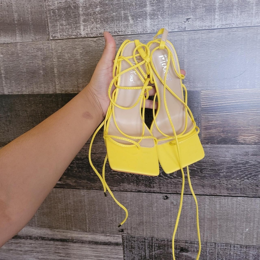Yellow strappy heels